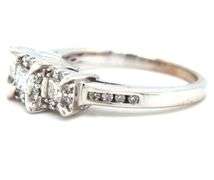 14kt White gold 0.65ctw princess and round brilliant cut 3 stone diamond halo ring