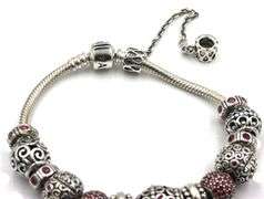 Pandora bracelet with red charms