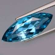 It's 5.10 carats! It's London Blue! It's marquise cut! It's 18.4mm long!