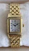 Simply stunning 18k yellow gold Jaeger-LeCoultre Reverso wristwatch with diamond accents