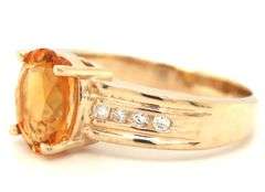 14kt Yellow gold oval citrine and channel set diamond ring