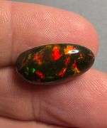 It's over 20mm long! And full of color! 5.80ct Black Opal from Ethiopia!