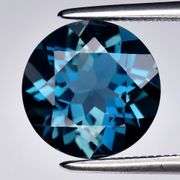Top London blue! 2.91ct 9mm VS grade Brazilian Topaz solitaire!
