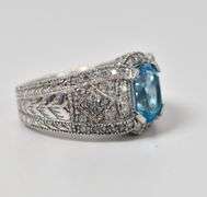 Sparkling 14K White Gold Blue Topaz Gemstone Ring with Diamond Accents