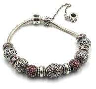Pandora bracelet with red charms