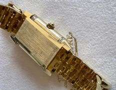 Simply stunning 18k yellow gold Jaeger-LeCoultre Reverso wristwatch with diamond accents