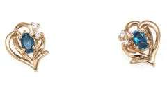 Set of 14kt Yellow gold oval blue topaz and diamond accent pendant on chain with matching earrings