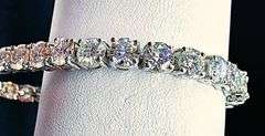 Spectacular 14 Kt White Gold Plated 19 Cttw 38 Count White Fire Moissanite Tennis Bracelet