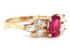 14kt Yellow gold oval tourmaline and marquise diamond ring
