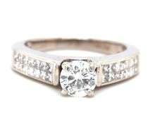 14kt White gold RBC diamond and princess cut Invisible set ring