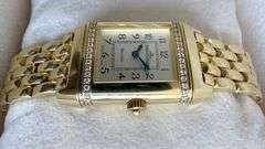 Simply stunning 18k yellow gold Jaeger-LeCoultre Reverso wristwatch with diamond accents