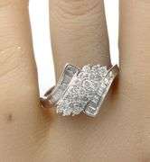 10kt White gold 0.76ctw RBC and baguette diamond cluster ring
