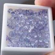 Heavy flashing! Untreated! 14.84ct oval cut Tanzanite set!