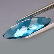 It's 5.10 carats! It's London Blue! It's marquise cut! It's 18.4mm long!