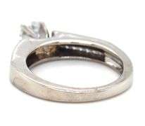 14kt White gold RBC diamond and princess cut Invisible set ring