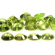 Dazzling 8.71ct untreated apple green Peridot set