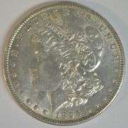 Satiny-white nearly BU 1896-O Morgan Silver Dollar. Scarce this nice
