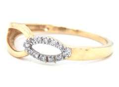 14kt Yellow gold infinity style diamond ring