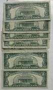 Seven 1953 Red Seal $2 US Notes.