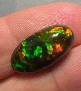 It's over 20mm long! And full of color! 5.80ct Black Opal from Ethiopia!