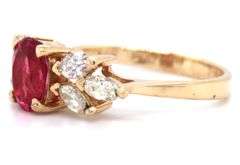 14kt Yellow gold oval tourmaline and marquise diamond ring