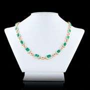 14K YELLOW GOLD EMERALD AND DIAMOND NECKLACE WITH WHITE ENAMEL 25.42 C.T.W.