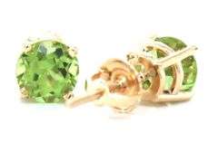 One pair of 14kt Yellow gold round Peridot stud earrings