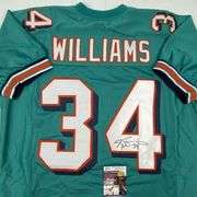 Ricky Williams Autographed Football Jersey with Authentication