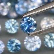 Gorgeous! 4.62ct Sapphire set with multiple blue hues and sizes!