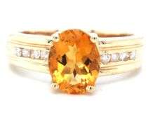 14kt Yellow gold oval citrine and channel set diamond ring