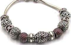 Pandora bracelet with red charms