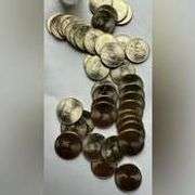 Four Rolls 2001 Uncirculated North Carolina State Quarters.