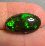 It's over 20mm long! And full of color! 5.80ct Black Opal from Ethiopia!