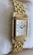Simply stunning 18k yellow gold Jaeger-LeCoultre Reverso wristwatch with diamond accents