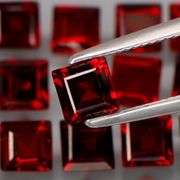 Tremendous 7.25ct princess cut cherry red Garnet set