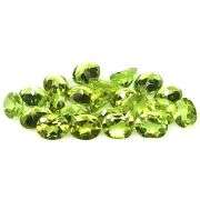 Dazzling 8.71ct untreated apple green Peridot set