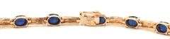 14kt Yellow gold 7.5ctw oval sapphire and diamond accent tennis bracelet