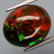 Full body flashing! Incredible color! 4.25ct Black Opal!