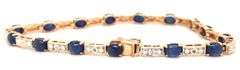 14kt Yellow gold 7.5ctw oval sapphire and diamond accent tennis bracelet