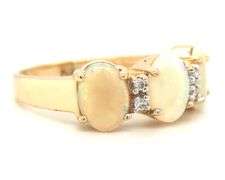 14kt Yellow gold Opal and diamond accent ring