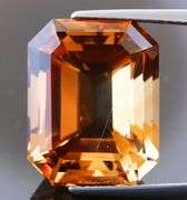 Electric flashing through rich color! Huge 23.08ct Imperial Topaz!