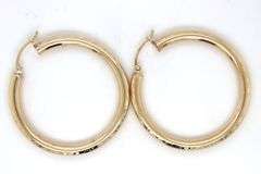 14kt Yellow gold diamond cut hoop earrings
