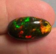 It's over 20mm long! And full of color! 5.80ct Black Opal from Ethiopia!