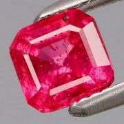 Heated only! Top crystal! .63ct vibrant red emerald cut Ruby!