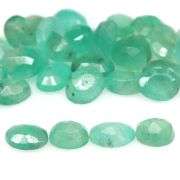 Vivid color in this 6.85ct Zambian Emerald set