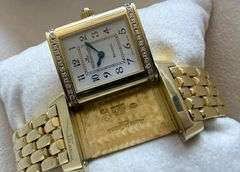 Simply stunning 18k yellow gold Jaeger-LeCoultre Reverso wristwatch with diamond accents