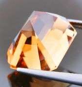 Electric flashing through rich color! Huge 23.08ct Imperial Topaz!