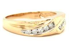 14kt Yellow gold 0.30ctw channel set diamond bypass ring