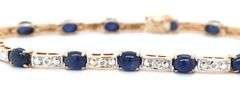 14kt Yellow gold 7.5ctw oval sapphire and diamond accent tennis bracelet