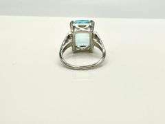 14 Kt White Gold Plate 6.5 Ct Simulated Sky Blue Topaz Ring.